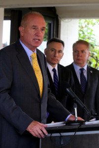 Speaking at a gathering with elected officials announcing a task force to confront rising heroin use, King County Sheriff John Urquhart said â€œwe canâ€™t simply keep doing the same thing over and over again and expect different resultsâ€. Listening at right is King County Executive Dow Constantine and at far right Seattle Mayor Ed Murray.